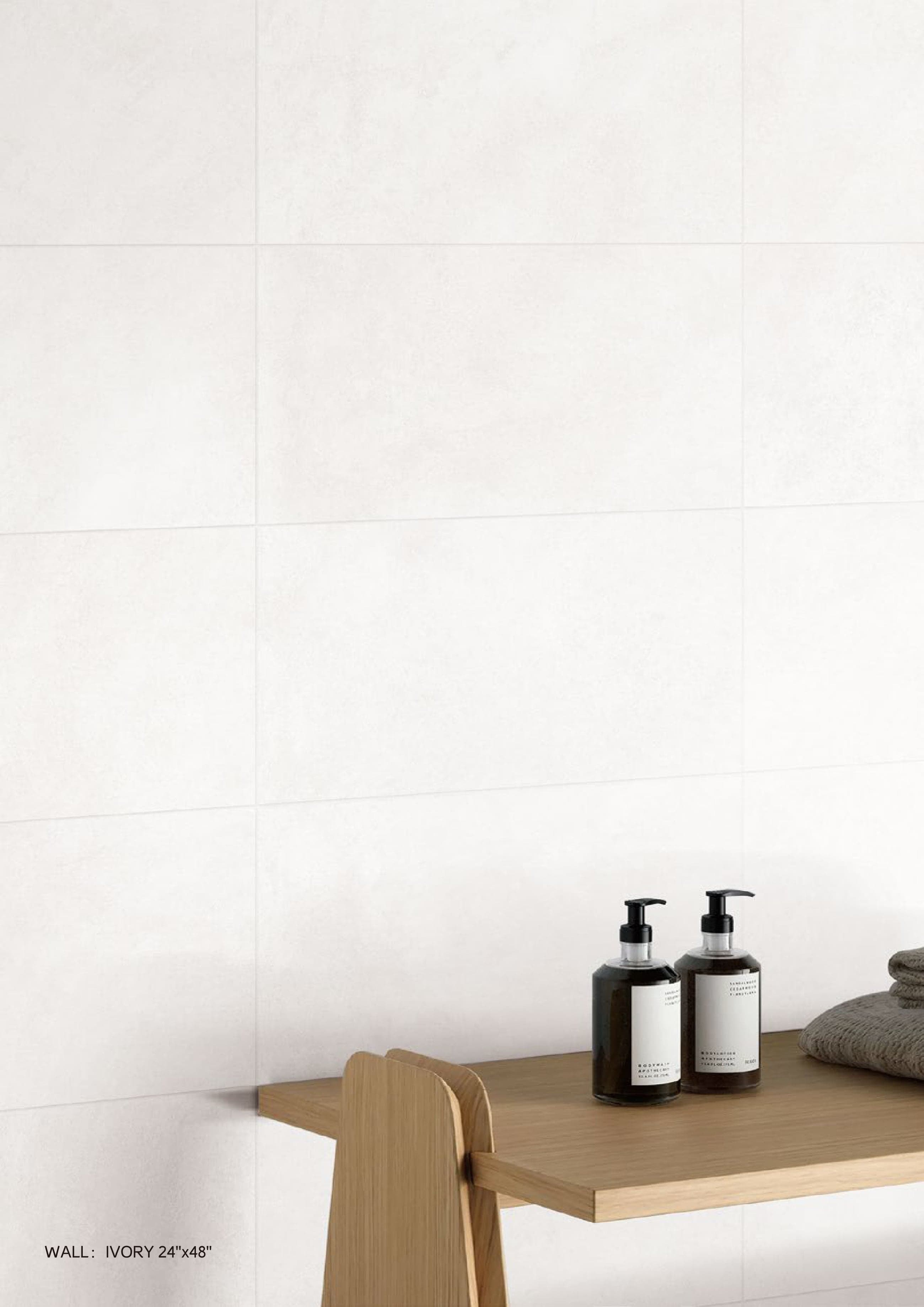 ACE Ivory tiled wall behind a wooden bath bench