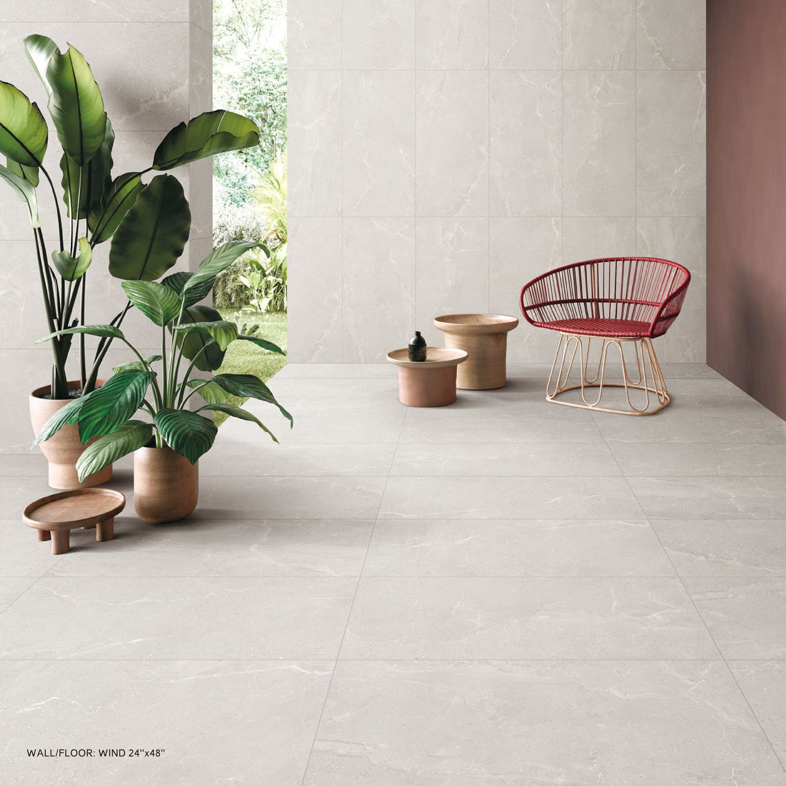 MONZA porcelain tile in a bright indoor-outdoor lounge