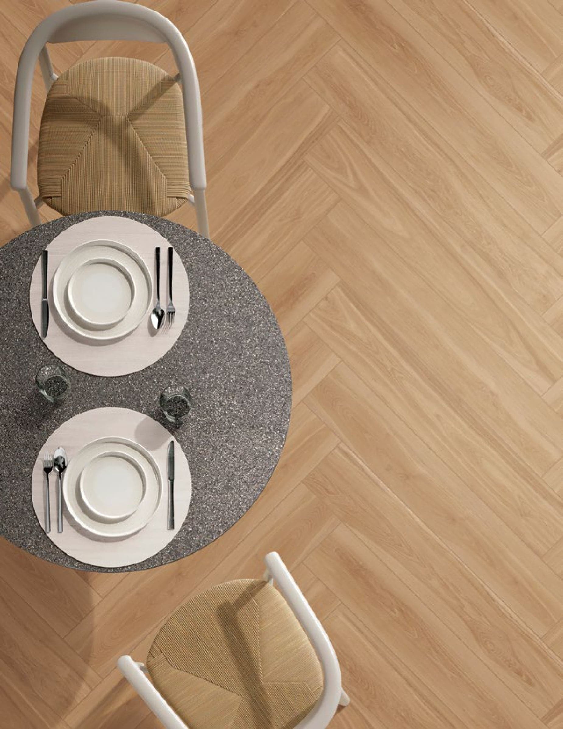 RIVER WOOD Pure herringbone floor under a dining table